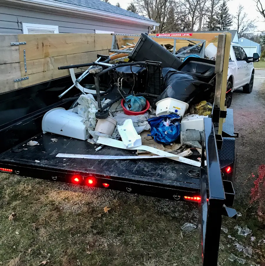 Roll-off dumpster delivered to a residential driveway in Alamo